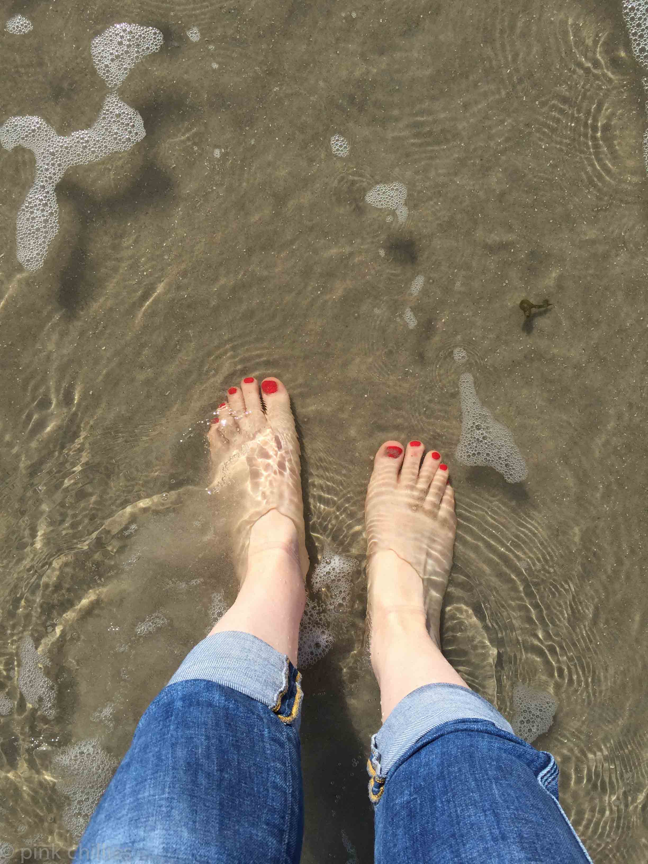 Füße im Meer