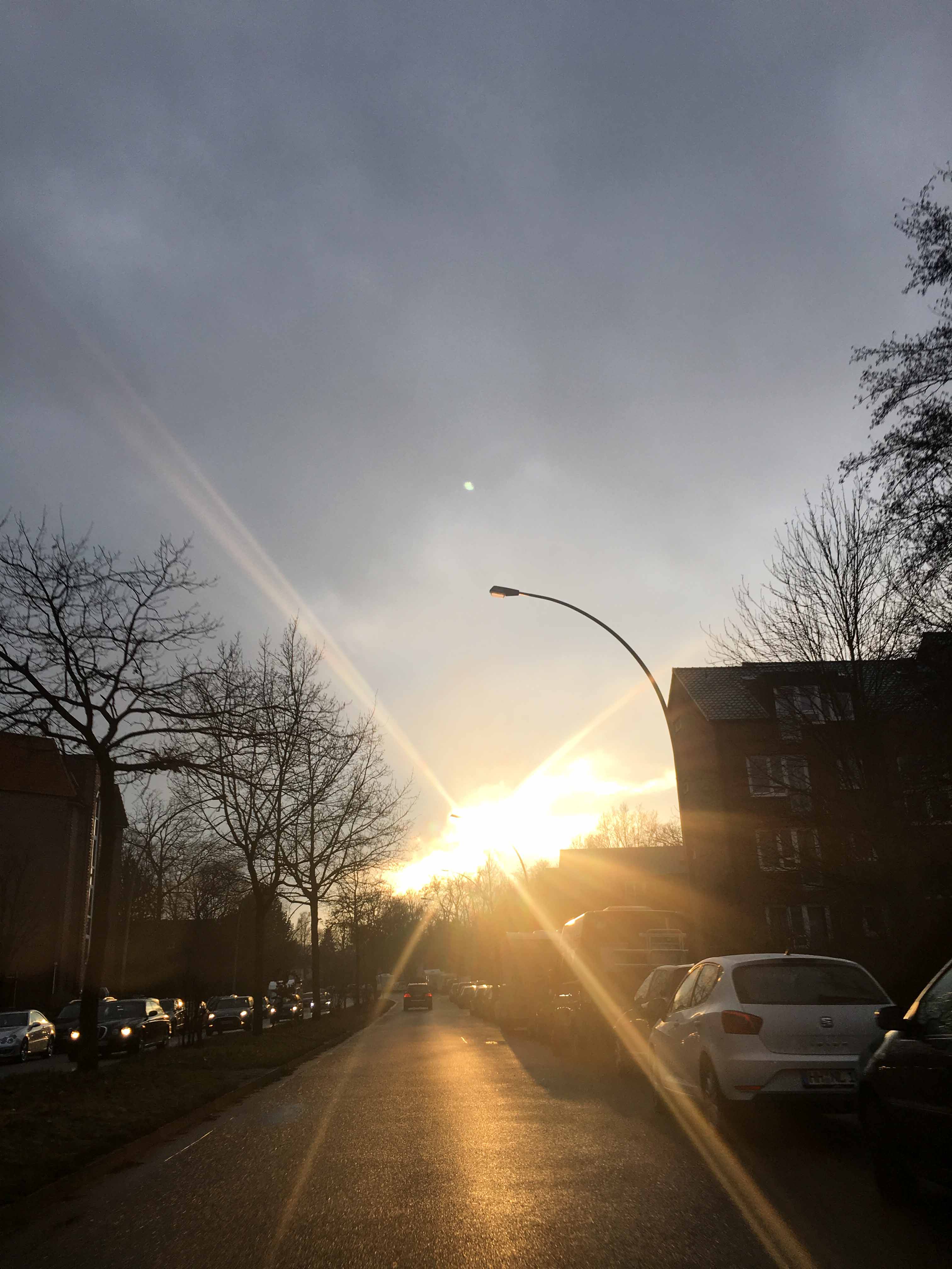 Isfeldstraße Sonne bricht aus Wolken